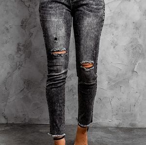 Acid washed raw him jeans